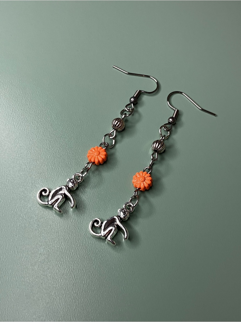 Handmade Silver Tone Monkey Dangle Earrings with Orange Flower Beads - Picture 2 of 5